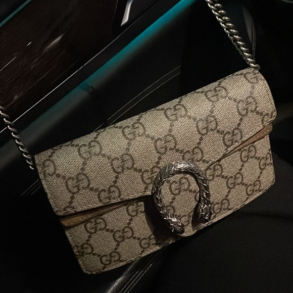 Barely worn Authentic Gucci mini handbag. Beautiful bag but I barely wear it. - Picture 5 of 5